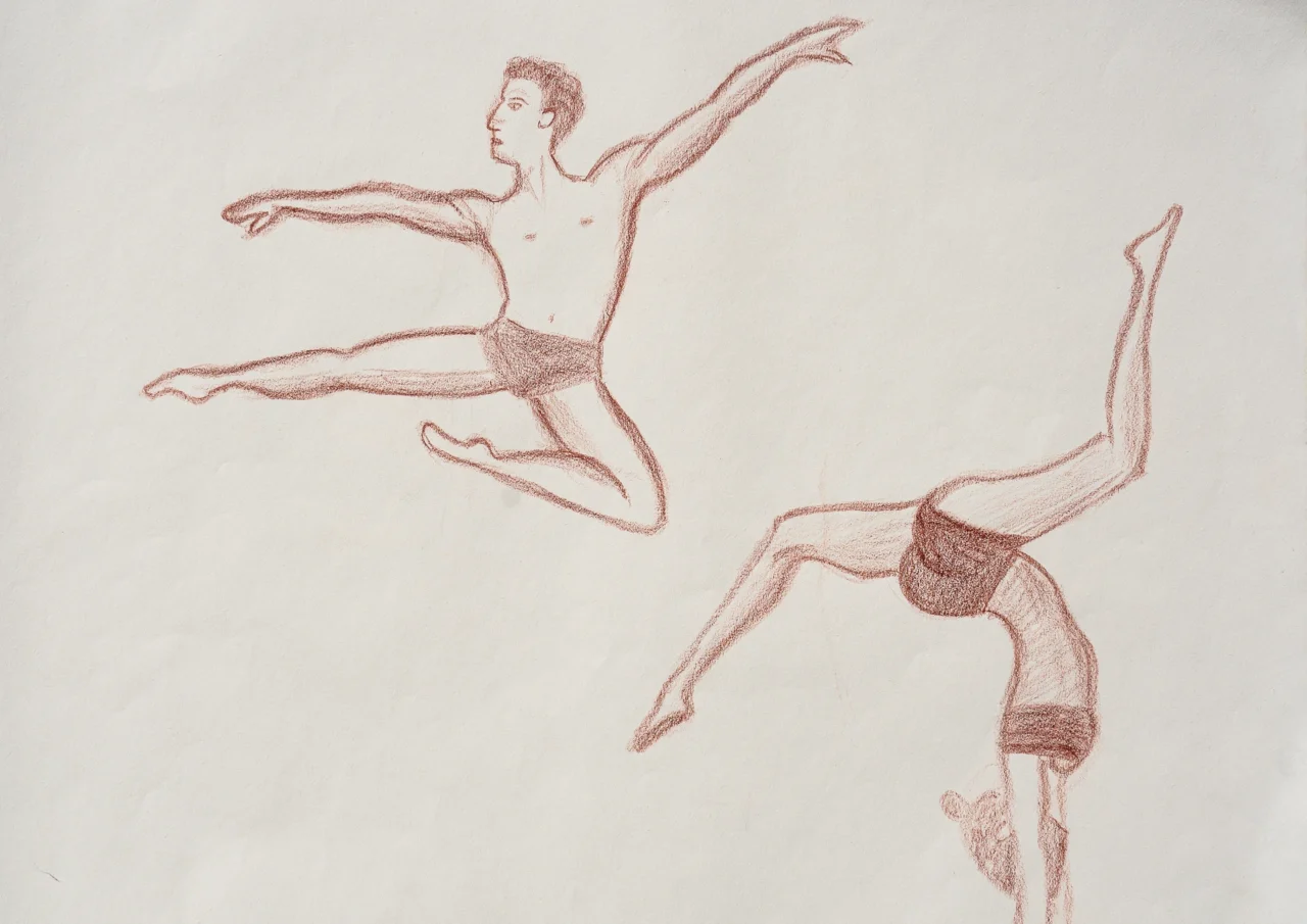A male and a female figures doing gymnastic positions